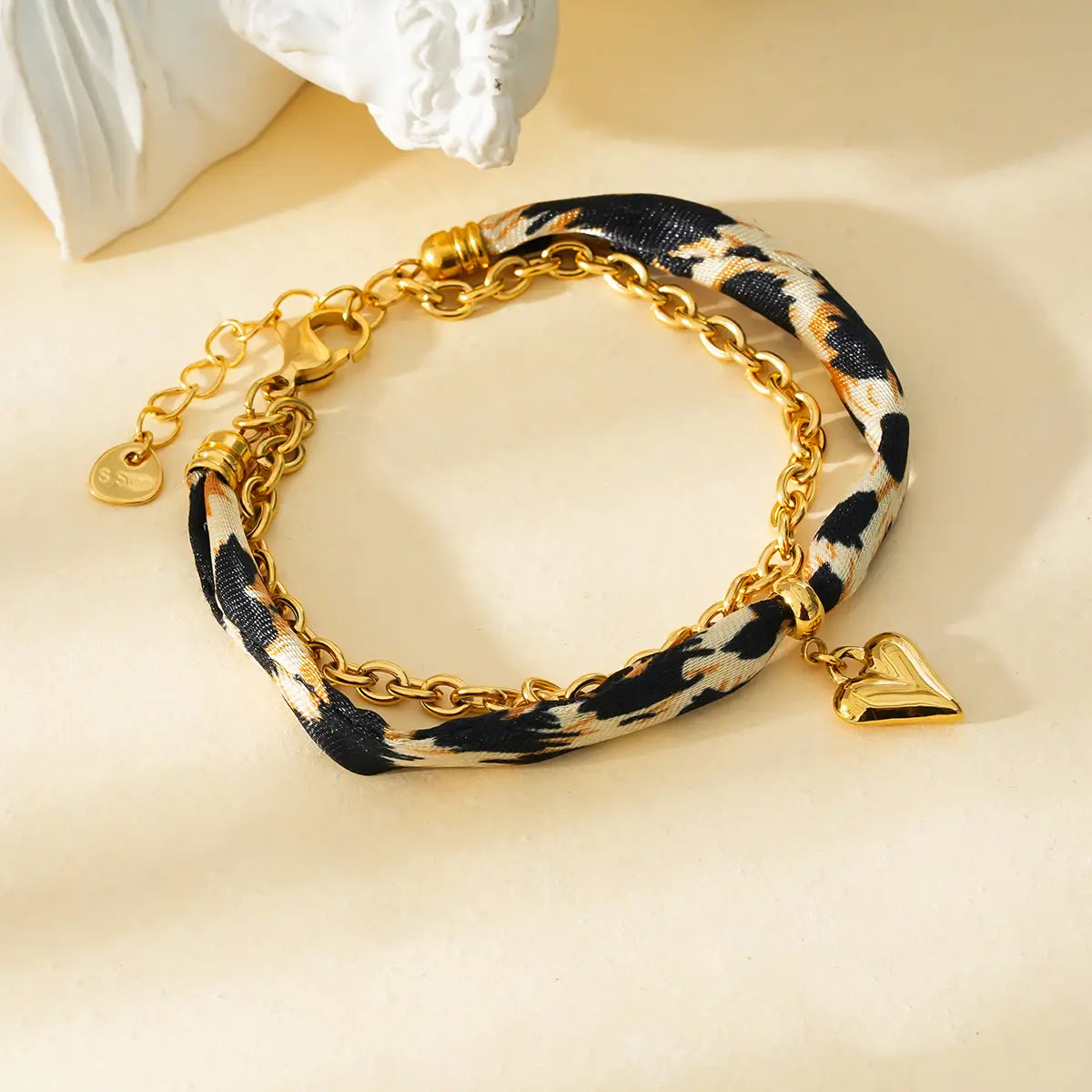 Bracelet doré léopard coeur