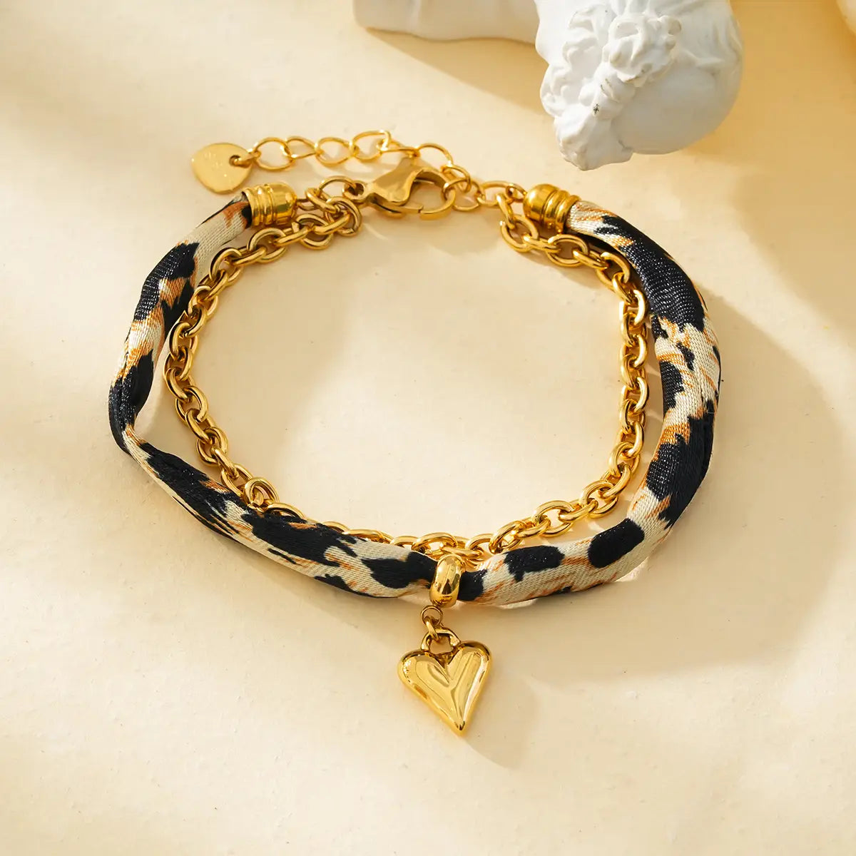 Bracelet doré léopard coeur