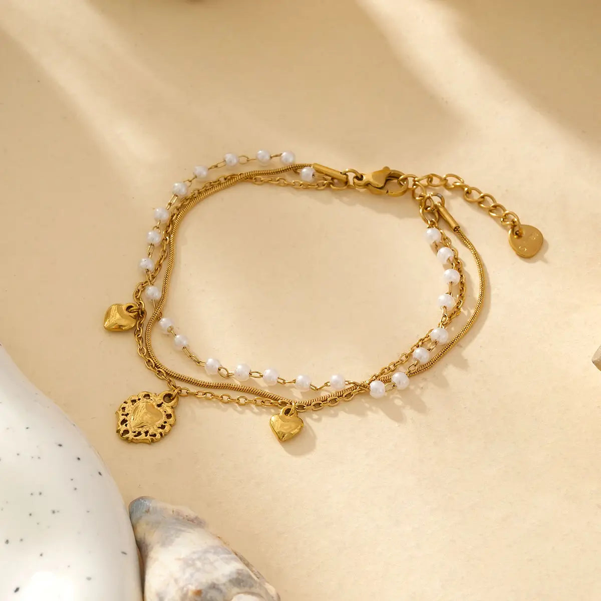 Bracelet doré coeur et perles