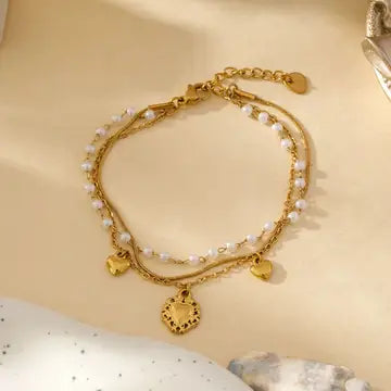 Bracelet doré coeur et perles